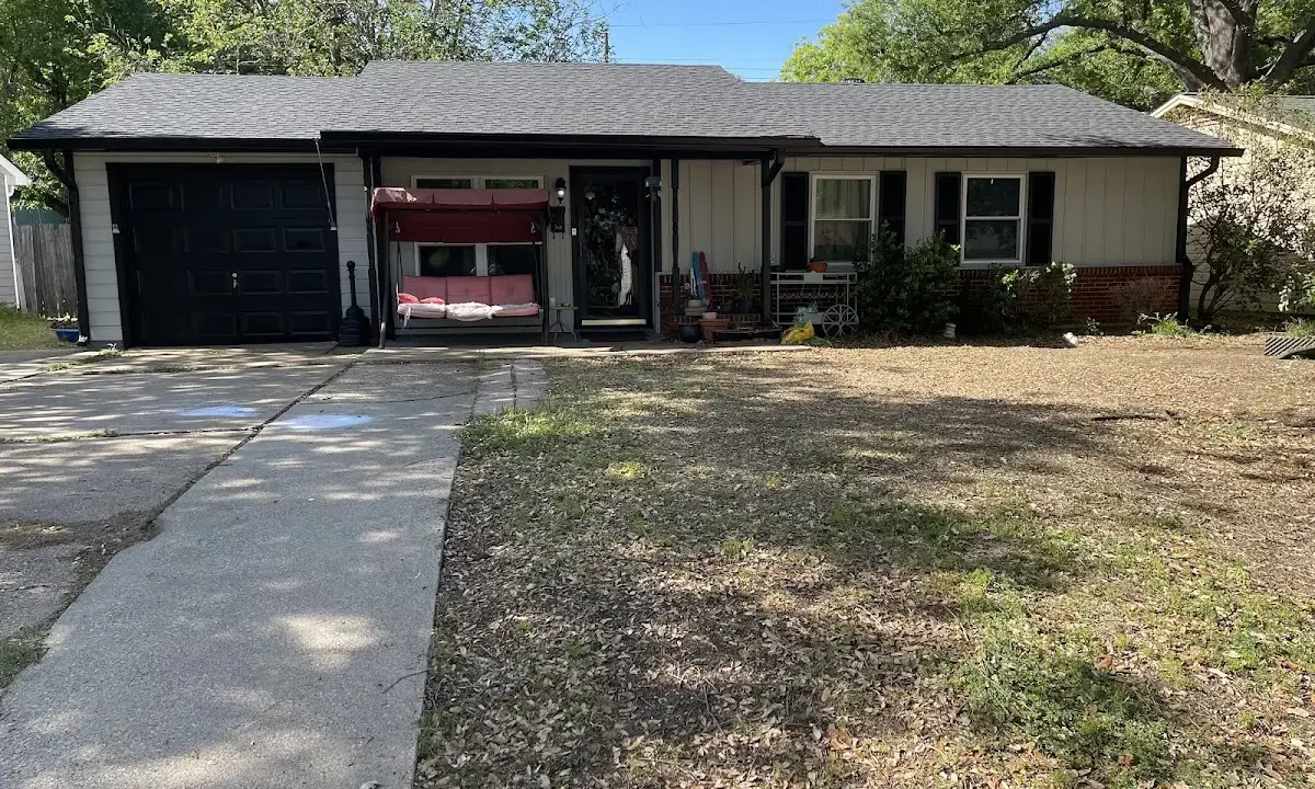 Asphalt Shingle Roof Repair crew at work on a residential roof in Waxhaw